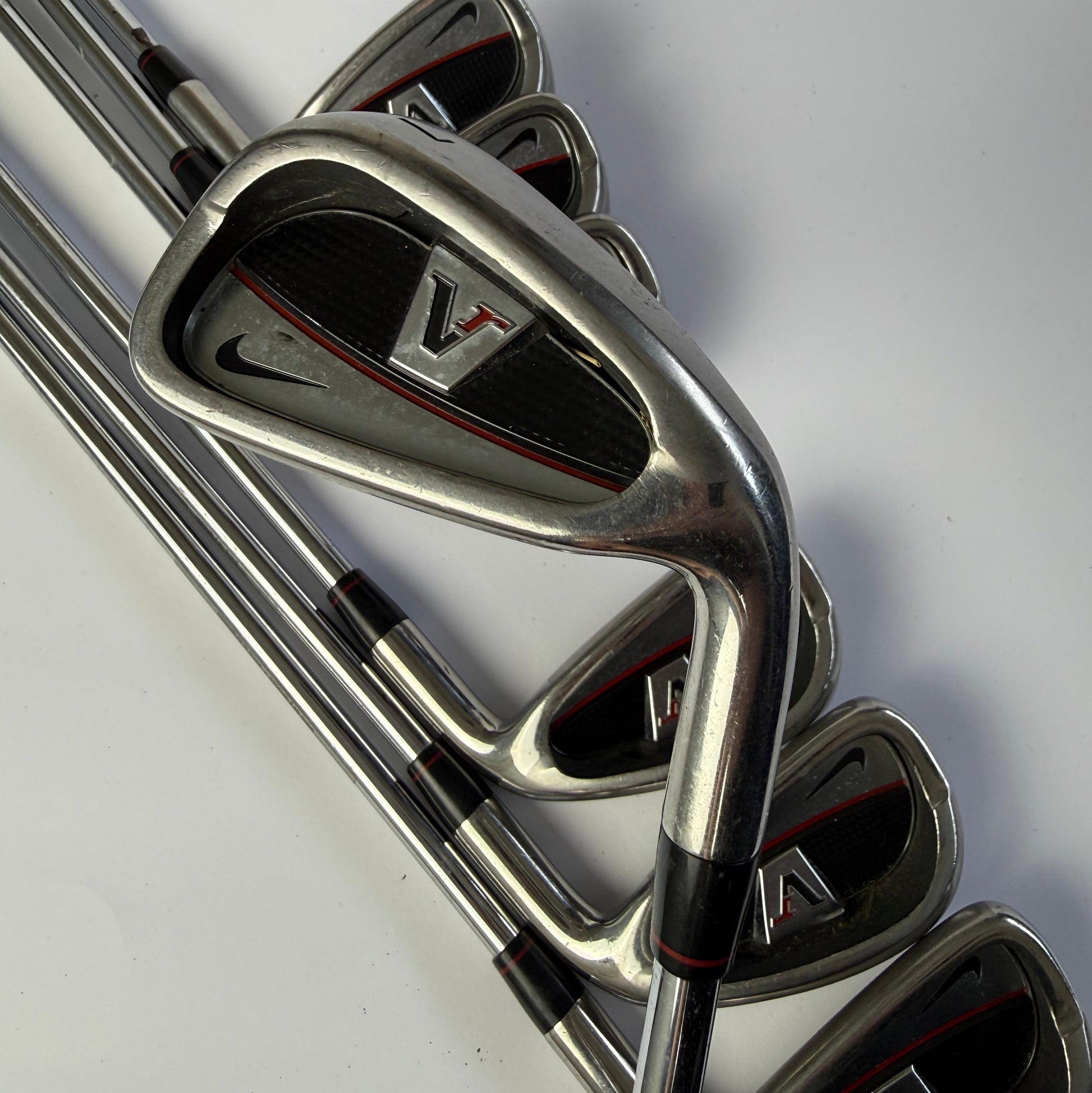 Nike VR iron set golf clubs on a white background