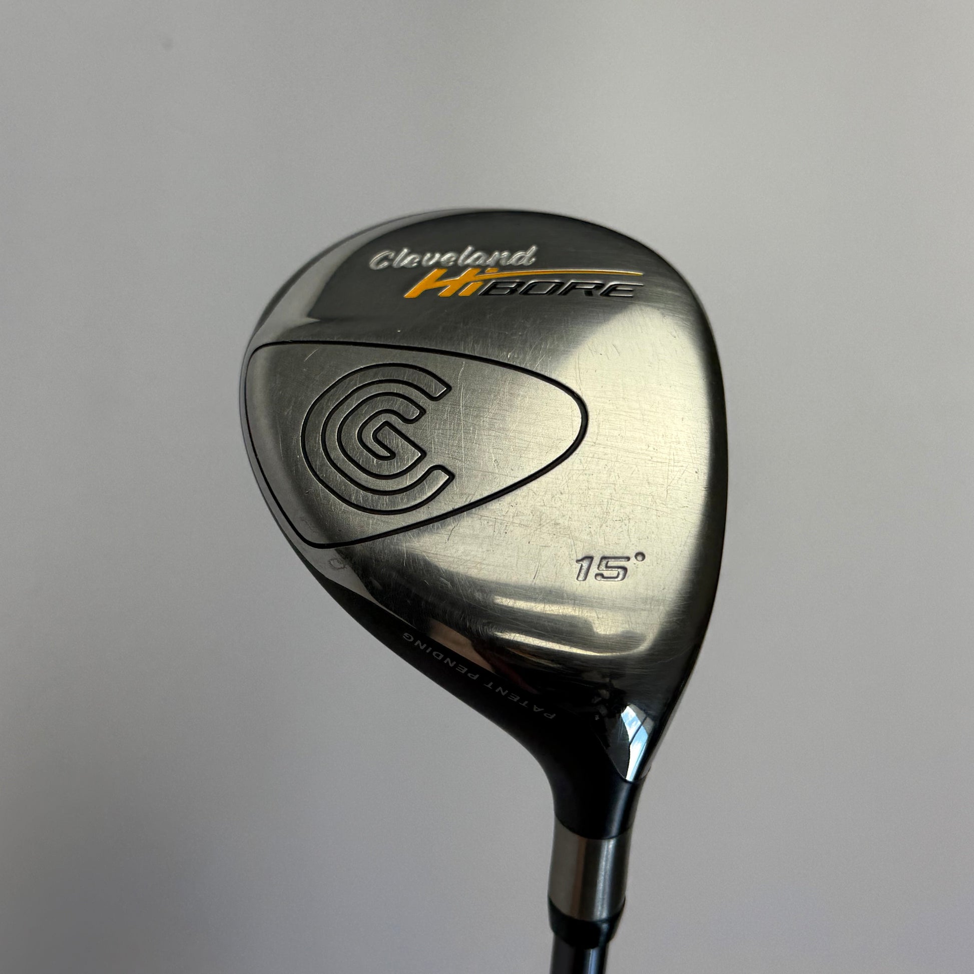 Right handed fairway wood golf club with Cleveland HiBore branding on a gray background