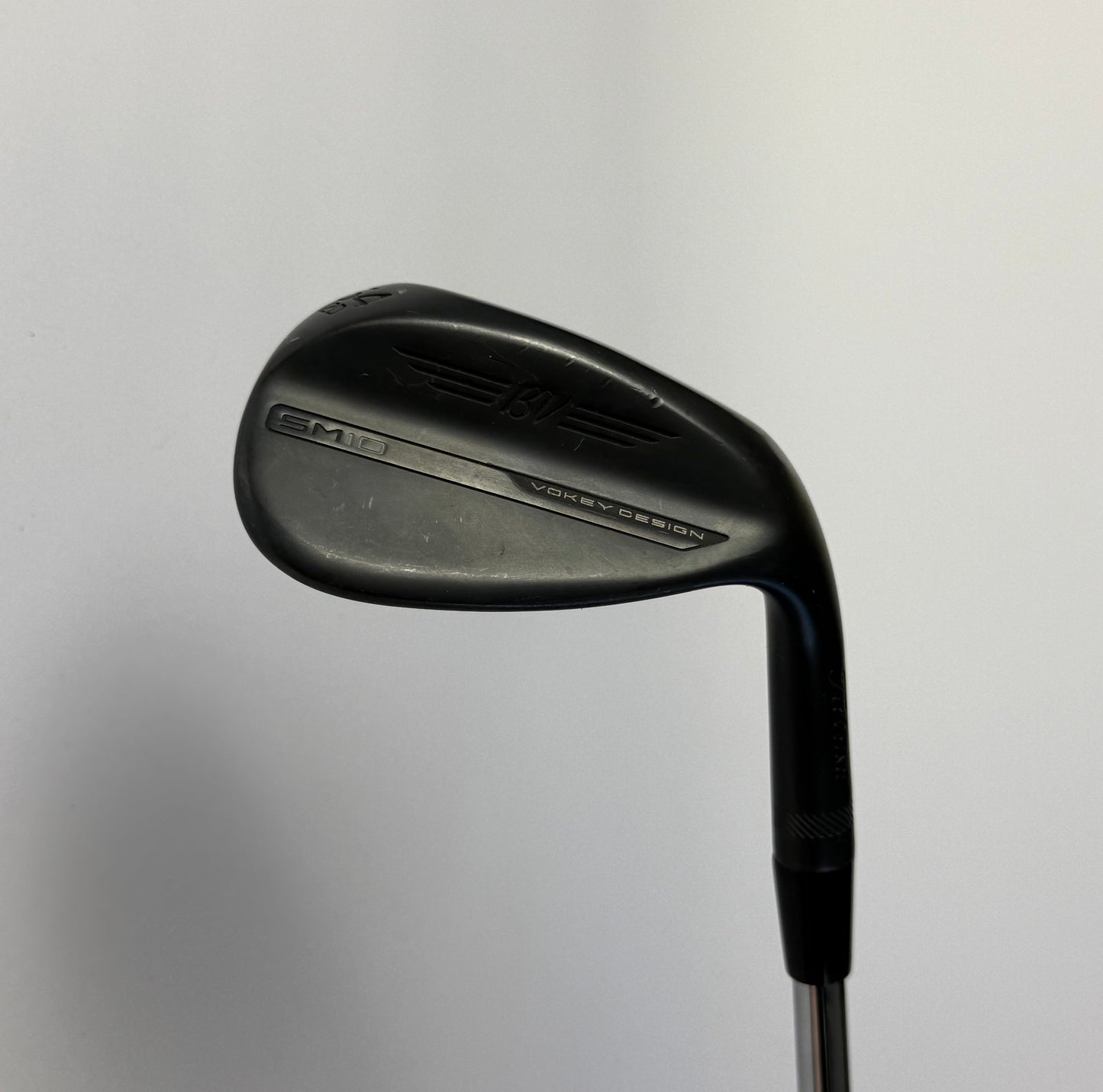 Titleist Vokey SM10 Wedge Golf club on a white background