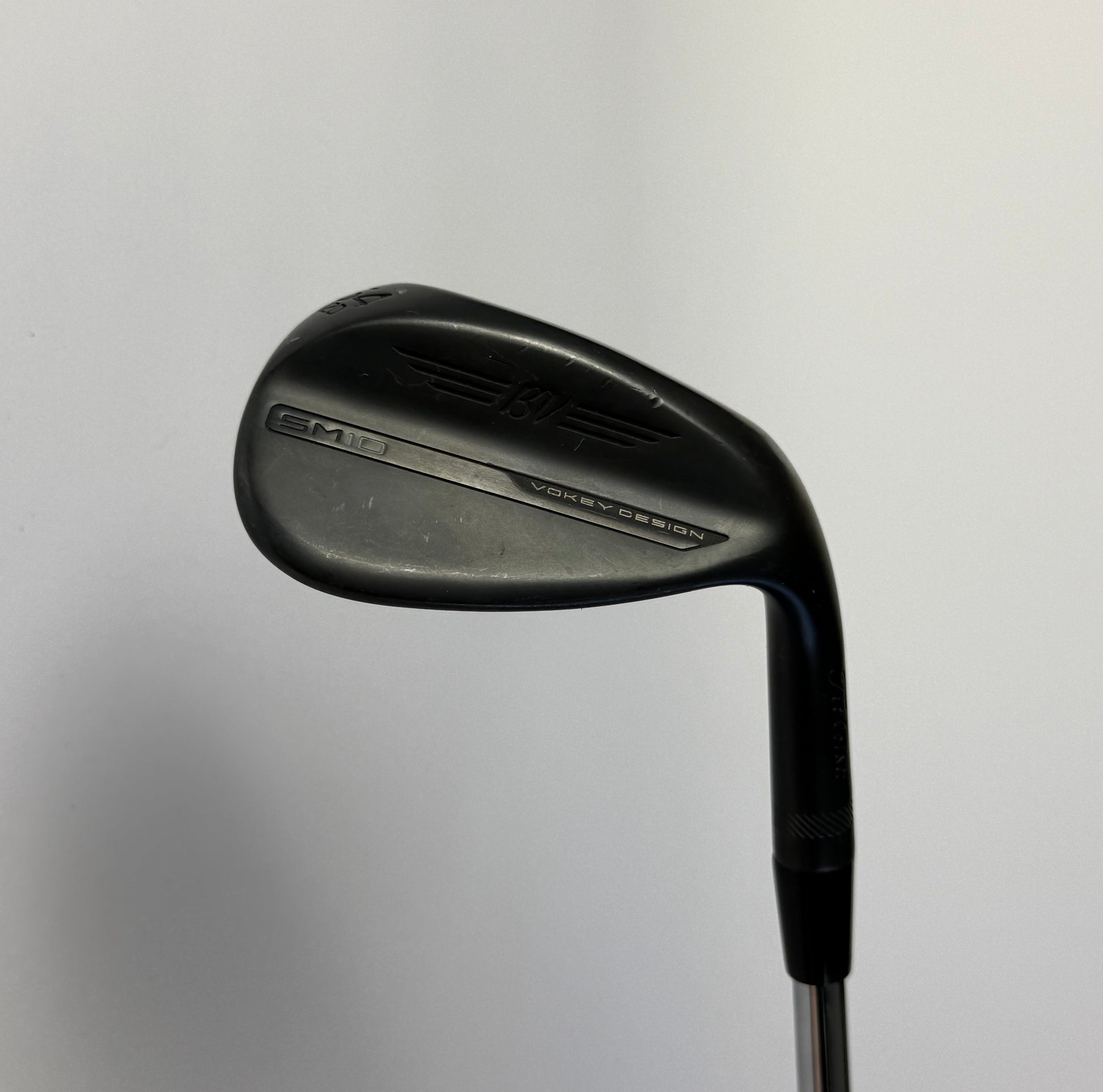 Titleist Vokey SM10 Wedge Golf club on a white background