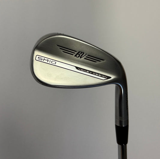 Titleist Vokey SM10 Wedge Golf club  on a gray background