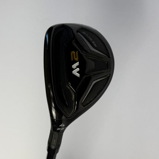 Taylormade M2 hybrid golf club on a gray background