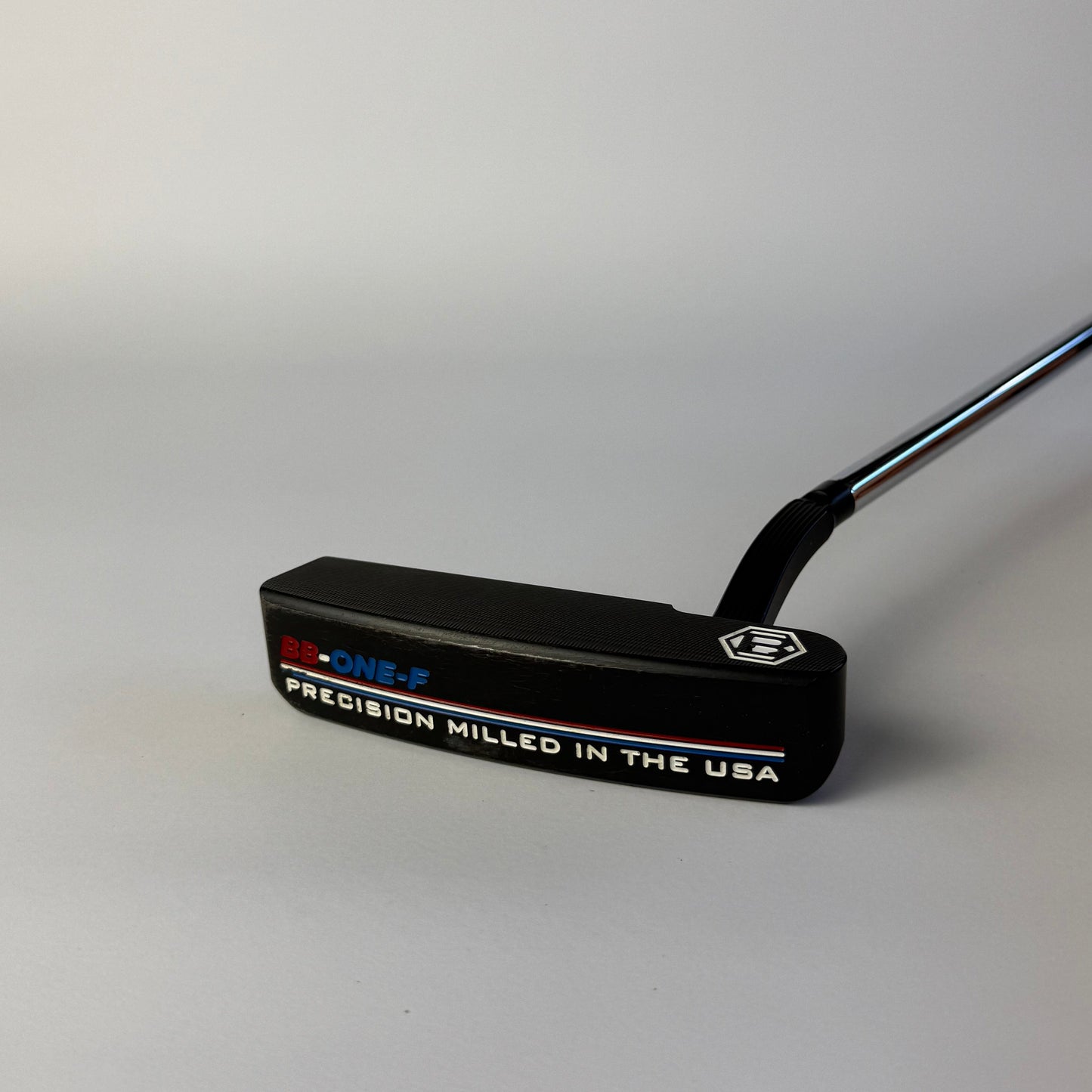 Golf putter with Bettinardi branding on a white background