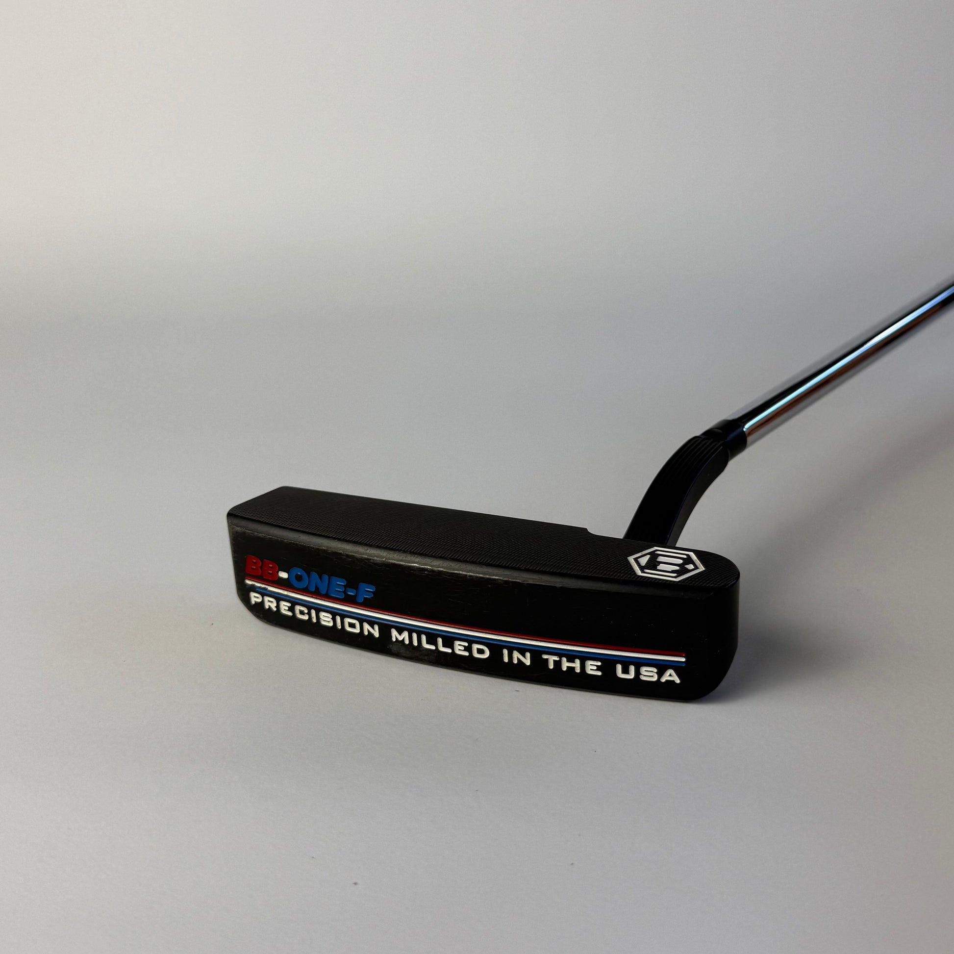 Golf putter with Bettinardi branding on a white background
