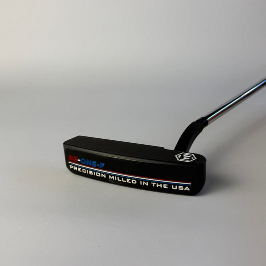 Golf putter with Bettinardi branding on a white background