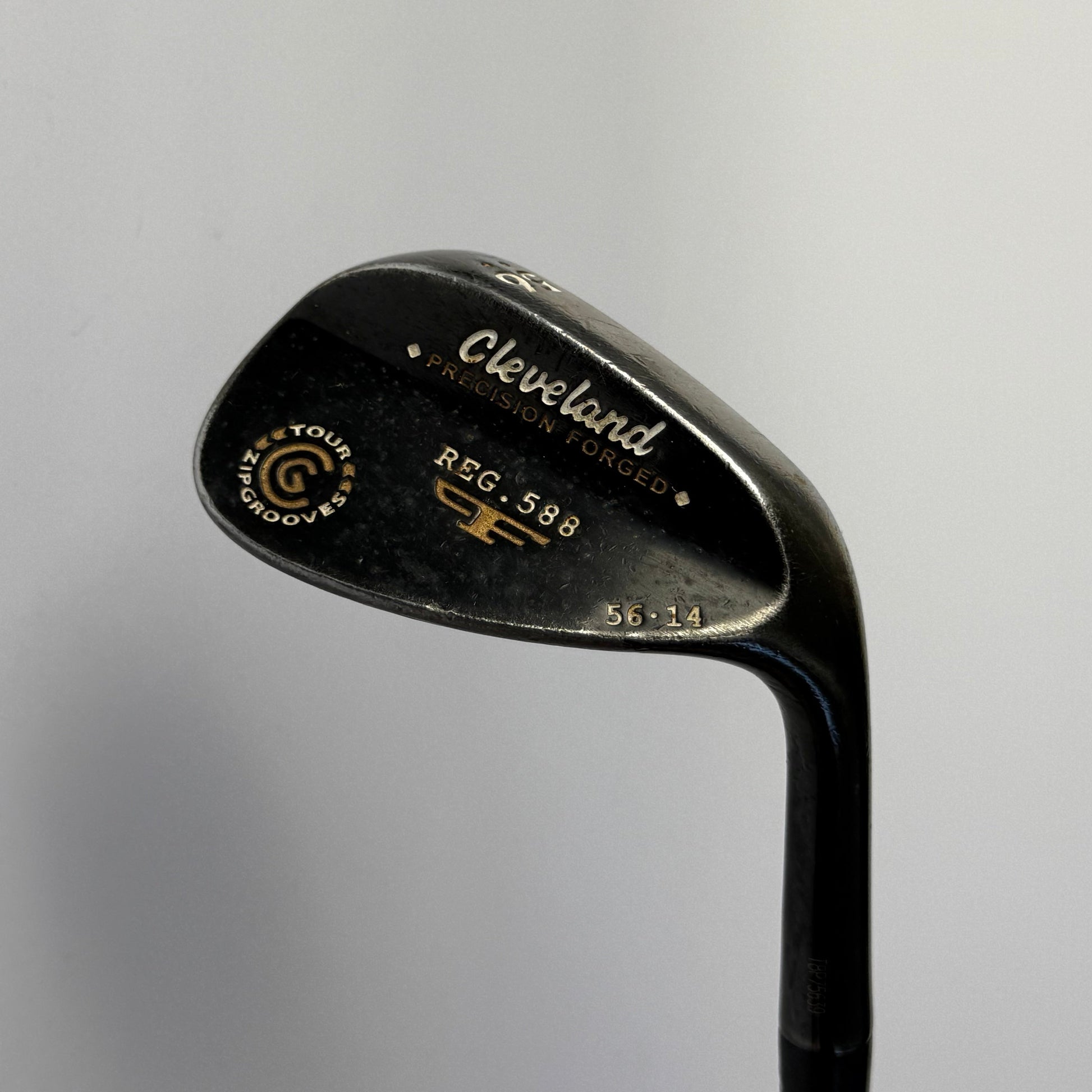 Cleveland wedge golf club on a white background