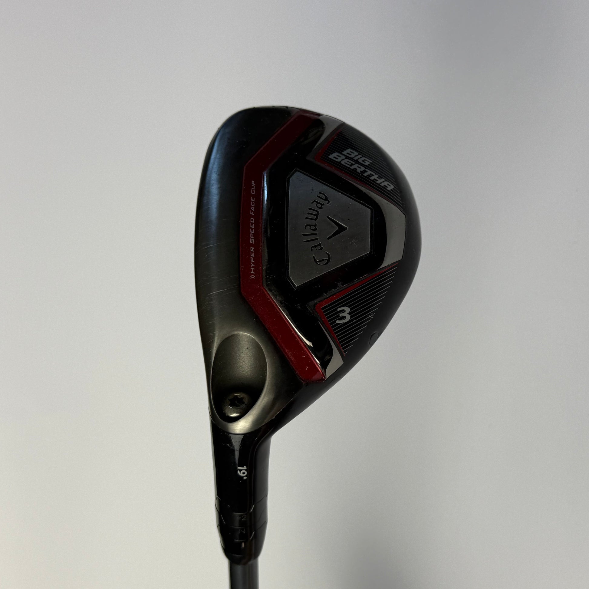 Hybrid golf club with a Callaway Big Bertha brand logo on a gray background