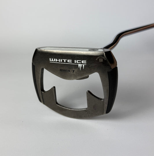 Golf putter with 'Odyssey White Ice' branding on a gray background